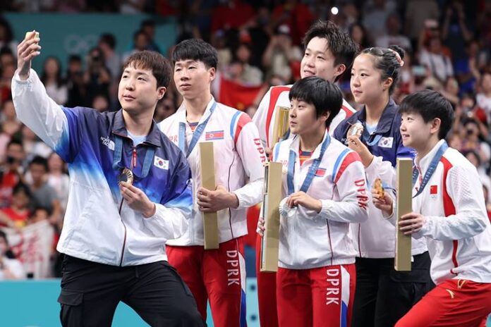 Shimoliy koreyaliklar olimpiadada selfiga tushgani uchun jazolanishi mumkin